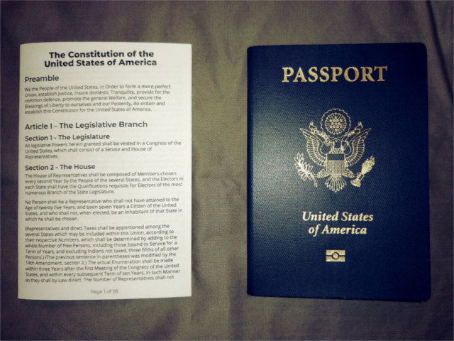 Photo of the Constitution next to a US Passport